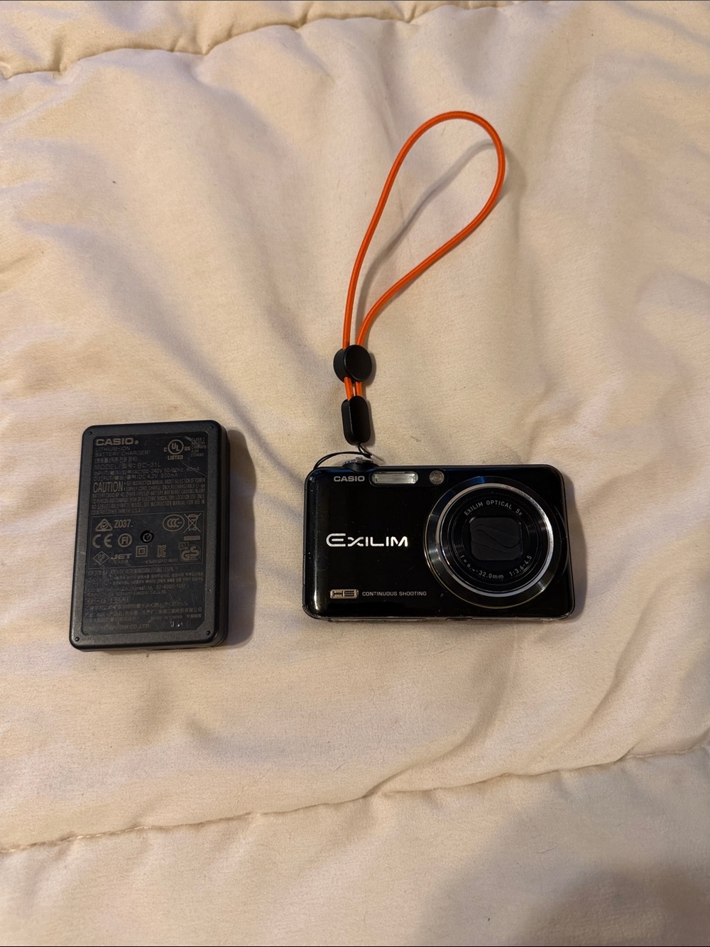 Casio Exilim Black Digital Camera with Orange Wrist Strap